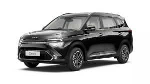 2023 Kia Carens 7-seater MPV in glossy black, front three-quarter studio view, isolated on transparent background